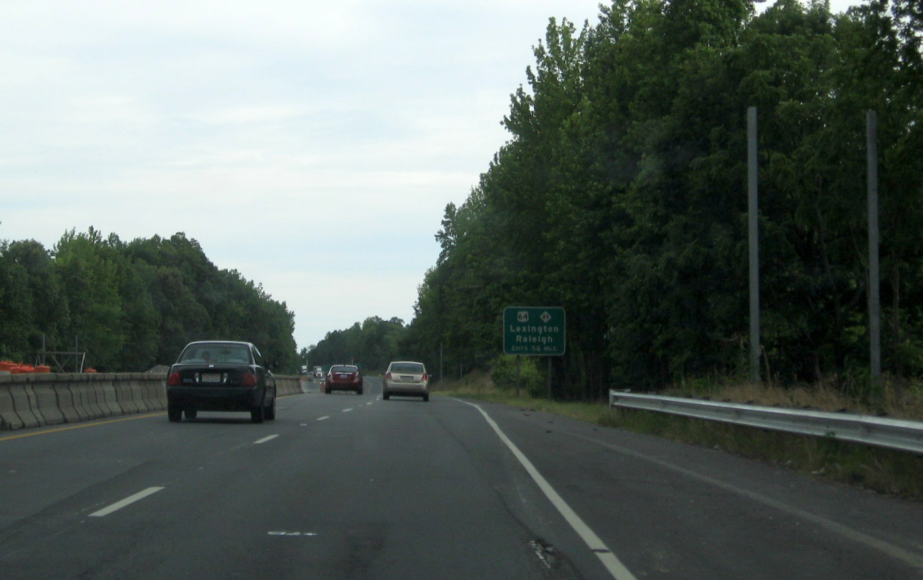 Photo of new sign posts for I-73/I-74 south of NC 42 in Asheboro