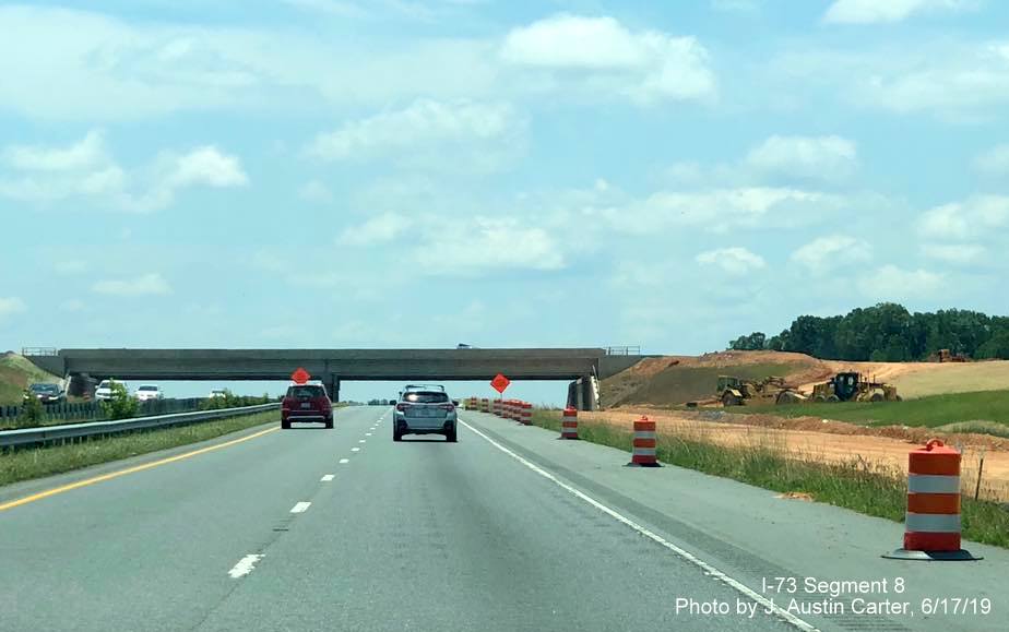Image of nearly completed US 64 Bypass bridge over I-73 South/I-74 East, by J. Austin Carter