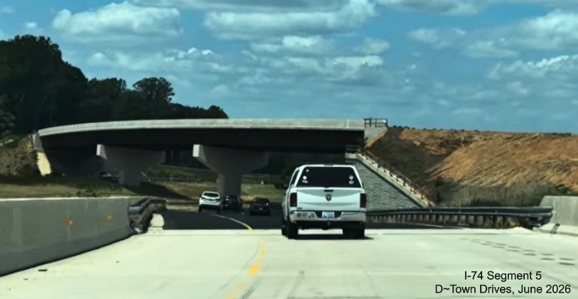 Image of traffic on future NC 192 West, current I-74 west, heading under
future ramp to the Winston-Salem from NC 192 East, D~Town Drives, June 2026