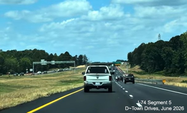 Image of traffic on future NC 192 West, current I-74 west, heading towards the
Ridgewood Road exit with final paving completed, D~Town Drives, June 2026