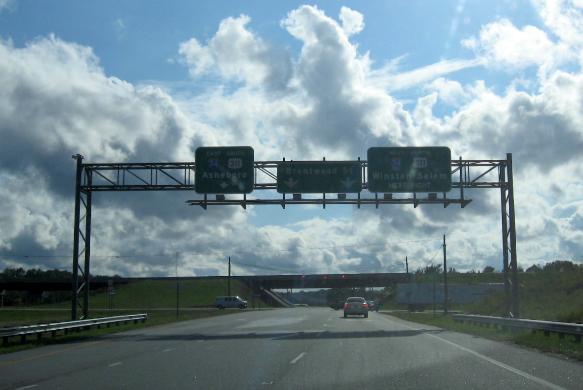 Photo of signage for on-ramp to I-74 West from Business 85 South in Oct. 
2011