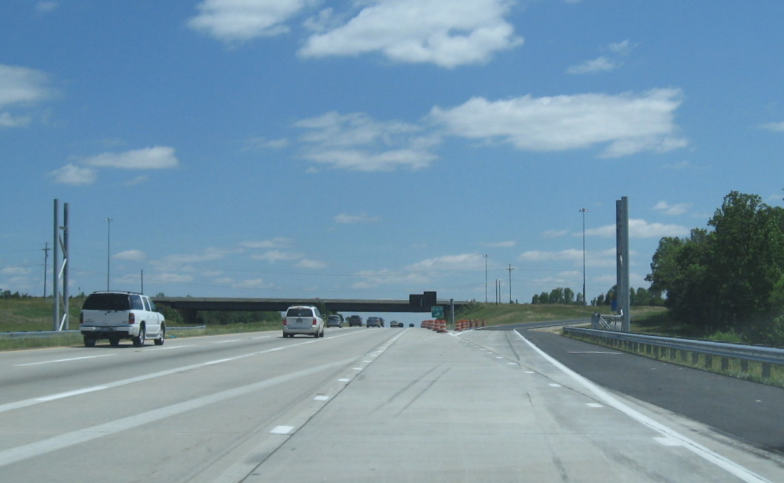 Photo of some of the first signs being placed on I-85 North for the I-74 
interchange in May 2010