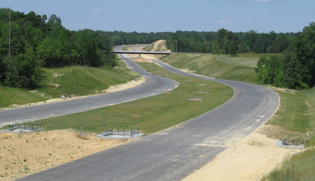 Photo of view from Kersey Valley Rd Bridge of unopened I-74 freeway from 
direction of Jackson Lake Rd Bridge, May 2010