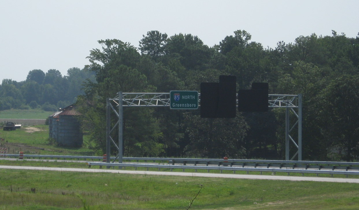 Photo of new sign assembly for I-74 West approaching the interchange on 
I-85 North in July 2010