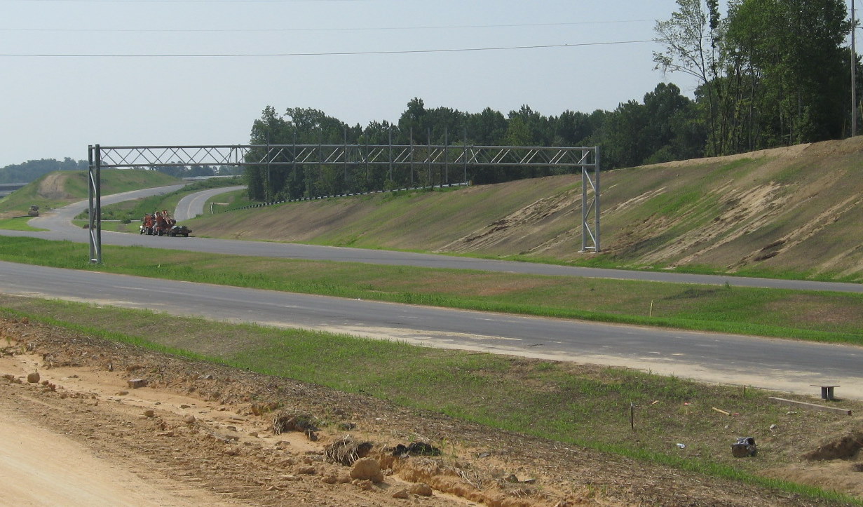 Photo of newly installed supports for I-85 exit signage fromm Dresden Road 
in July 2010