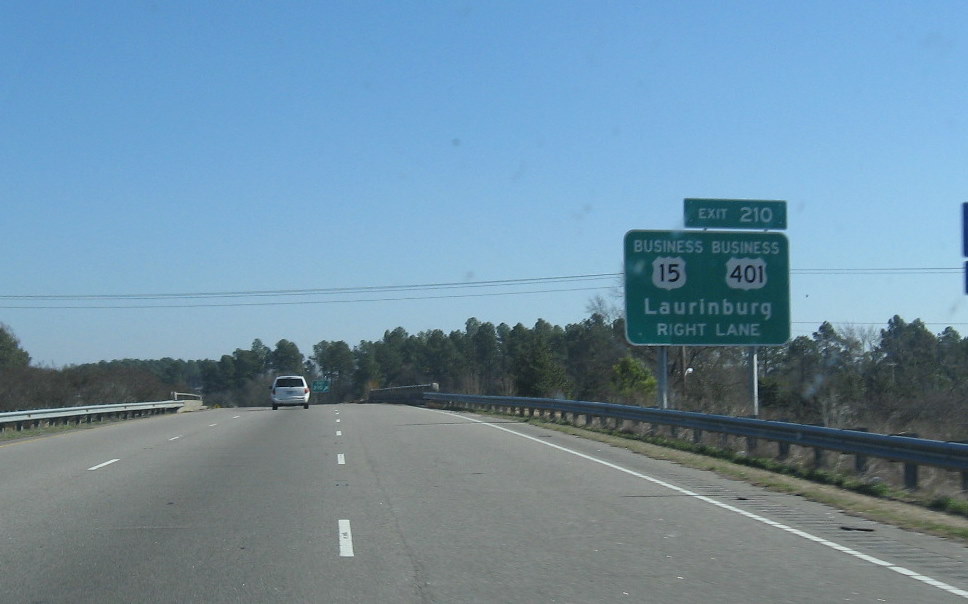 Photo of Bus 15 and 401 exit signs in Feb. 2009 with wrong exit numbers