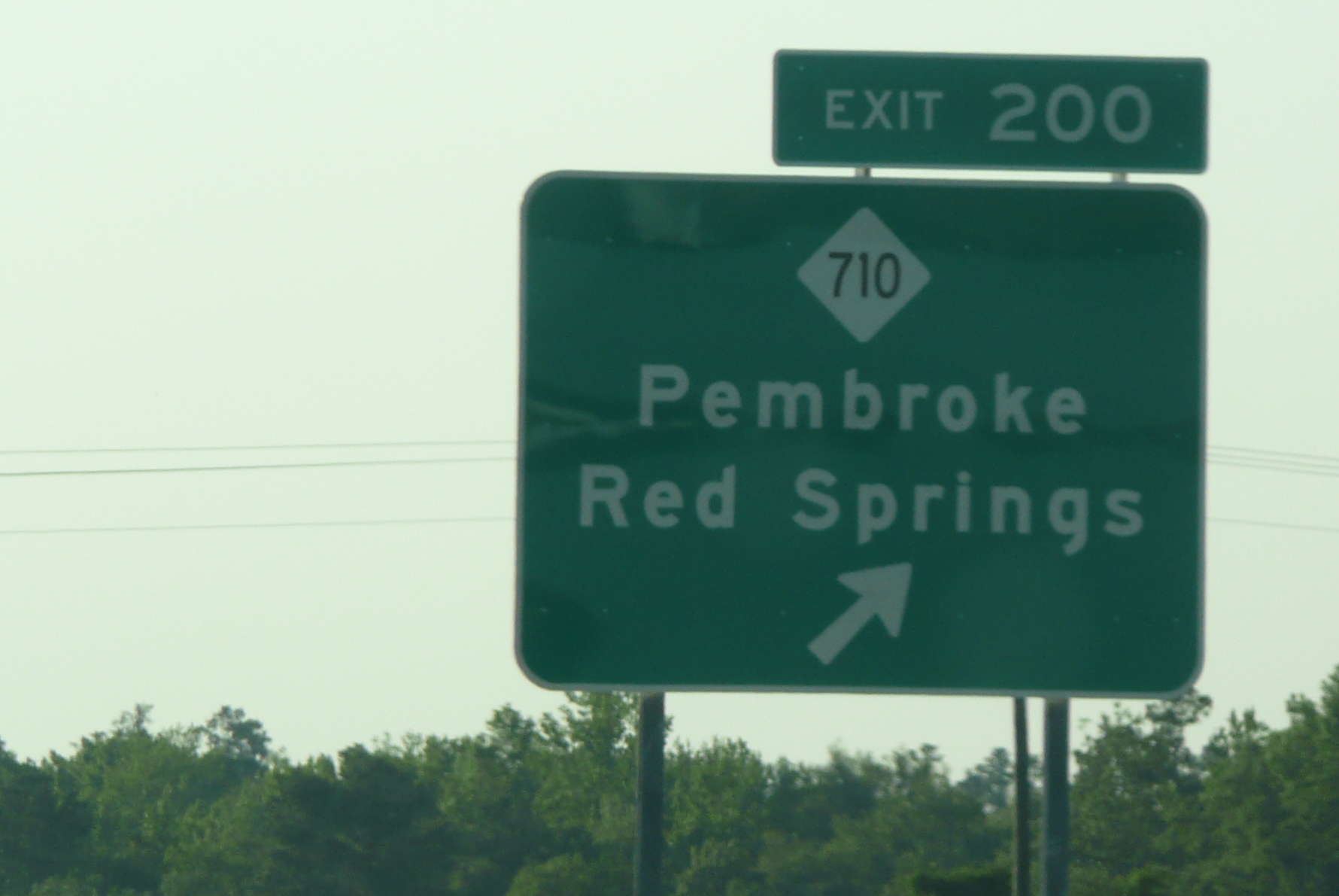 Photo of exit signage for NC 710 near Pembroke showing correct exit number, 
May 2009, courtesy of James Mast