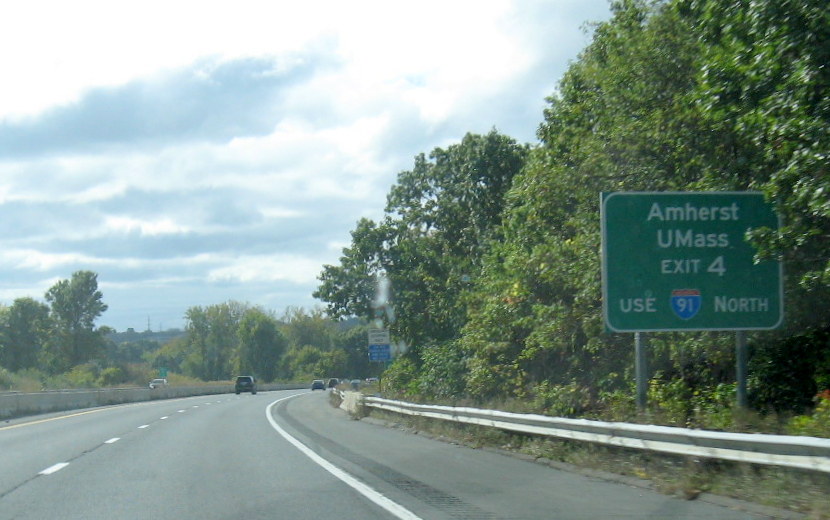 Auxiliary sign for UMass Amherst prior to I-91 Exit on I-90/Mass Pike West in Chicopee