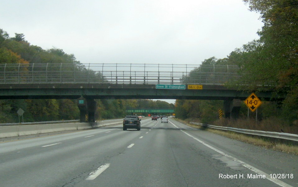 Image of redundant bridge height advisory signage on I-90/Mass Pike West in Framingham