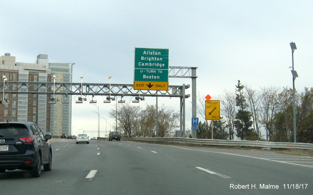 Image of newly placed advance overhead sign for Allston-Brighton/Cambridge exit on I-90 West in Boston