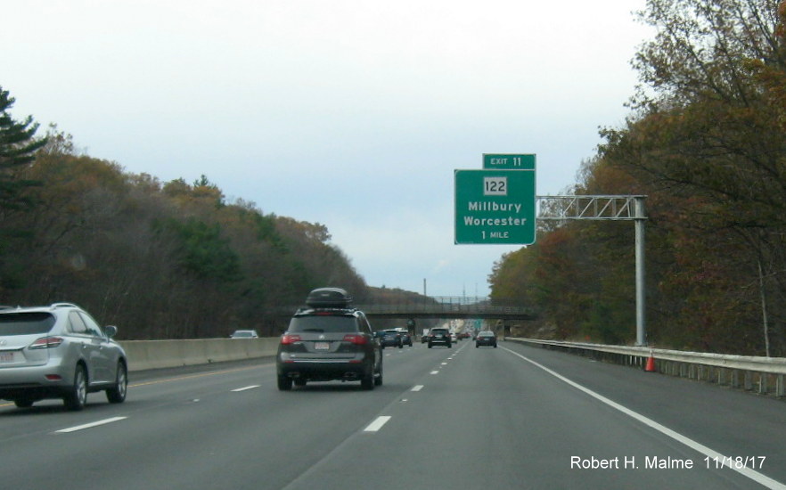 Image of newly placed overhead 1-Mile advance sign for MA 122 exit on I-90 West in Millbury