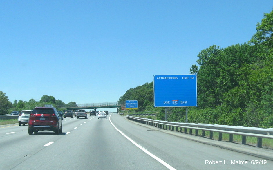 Image of new blue services sign on I-90/Mass Pike West without any logos in June 2019
