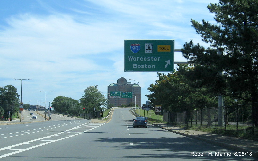Image of new cantilever posted guide sign at ramp to I-90/Mass Pike heading east on Cambridge St in Brighton