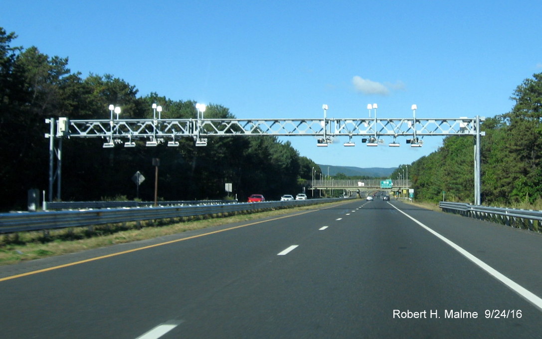 Image of electronic toll gantry over lanes of I-90/Mass Pike in West Springfield