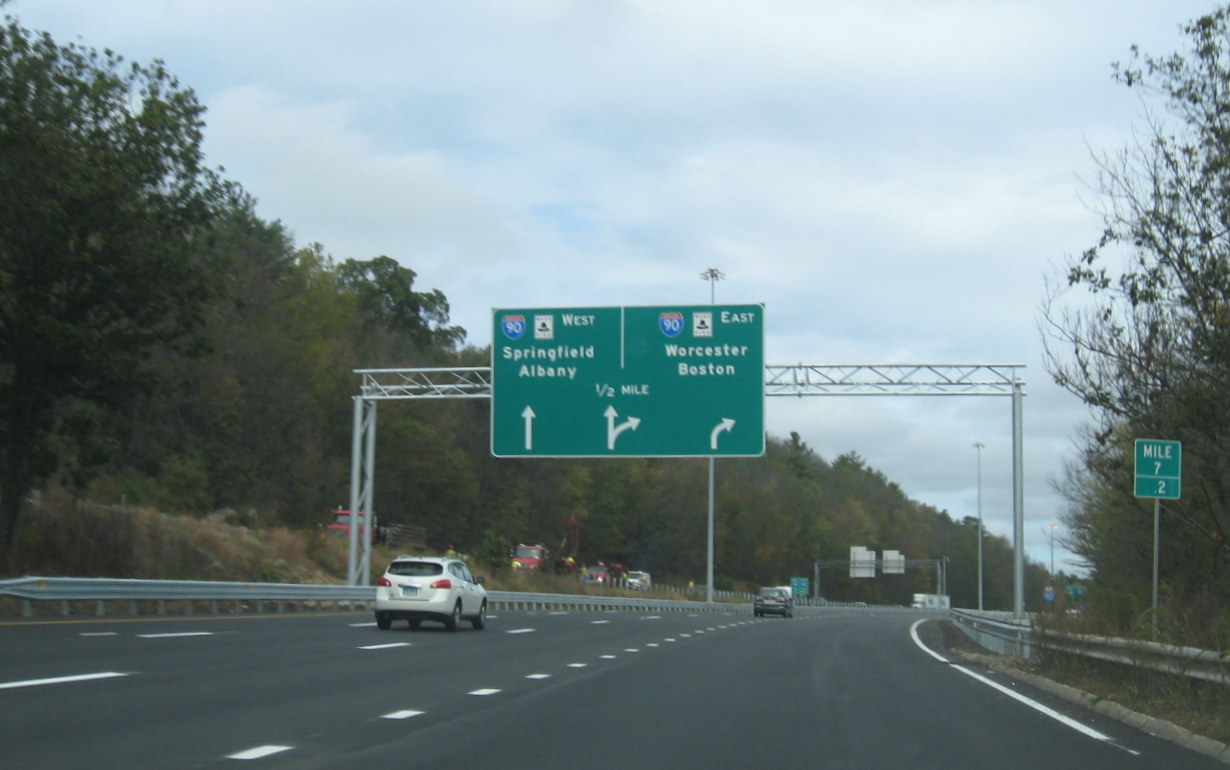 Image of newly placed arrow-per-lane overhead sign on I-84 East in Sturbridge
