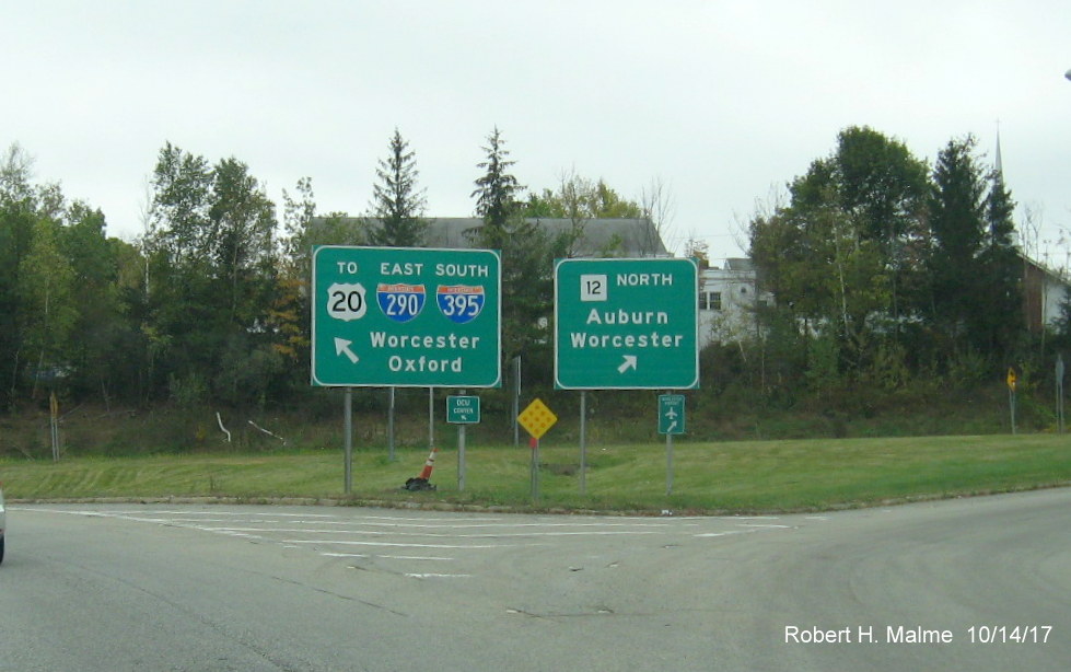 Image of old ramp signage for MA 12 and I-290/I-395 exits beyond site of former Auburn Toll Plaza on I-90/Mass Pike