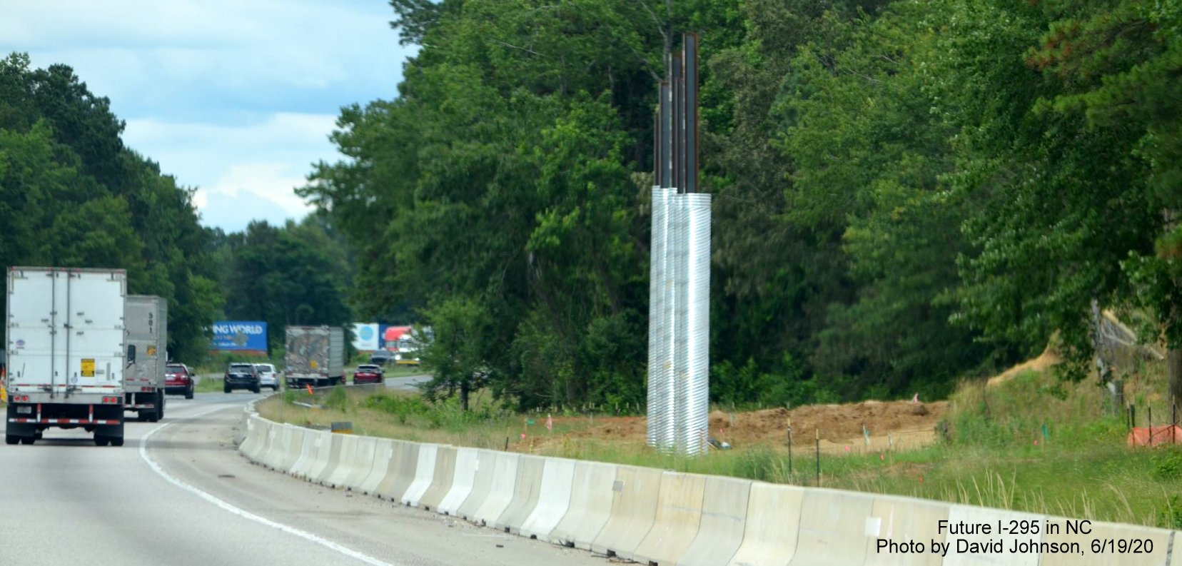 Image of future ramp bridge supports being placed along I-95 North for Future I-295 interchange near 
        Hope Mills, by David Johnson, June 2020