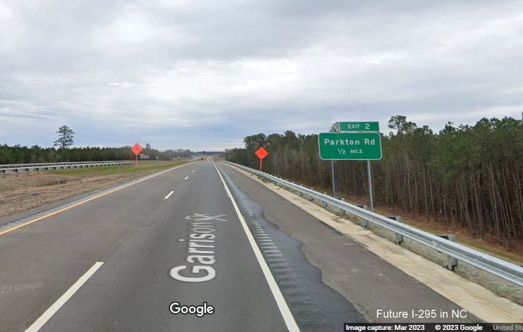 Image of South NC 295 trailblazer approaching on-ramp on Black Bridge Road, Google Maps 
        Street View, March 2023
