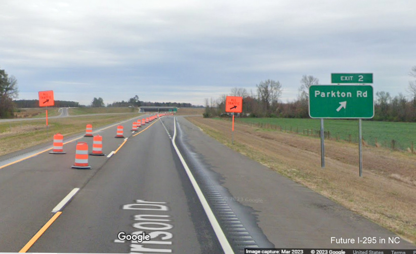 Image of ground mounted ramp sign along newly opened section of South 
        NC 295/Fayetteville Outer Loop for the Parkton Road exit, Google Maps Street View, March 2023