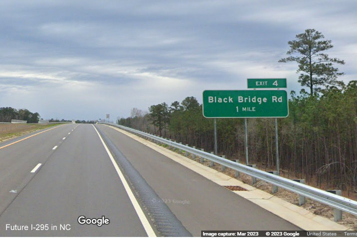 Image of ground mounted 1 mile advance sign for Black Bridge Road exit on newly opened section 
        of NC 295 North/Fayetteville Outer Loop starting at Parkton Road, Google Maps Street View, March 2023