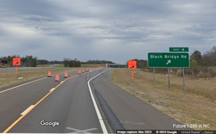 Image of ground mounted exit sign for Black Bridge Road exit on newly opened section 
        of NC 295 North/Fayetteville Outer Loop, Google Maps Street View, March 2023