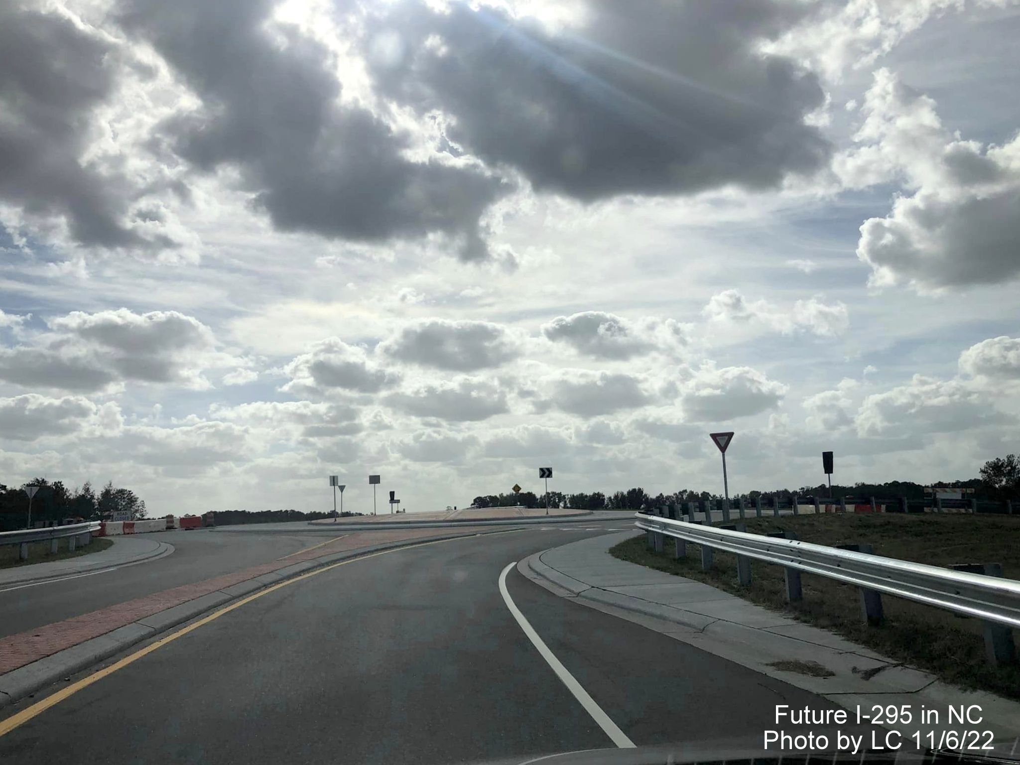 Image of view looking west along Parkton Road to new roundabout and soon to be opened ramp for 
                                                 Fayetteville Outer Loop north to Black Bridge Road, by LC, November 2022
