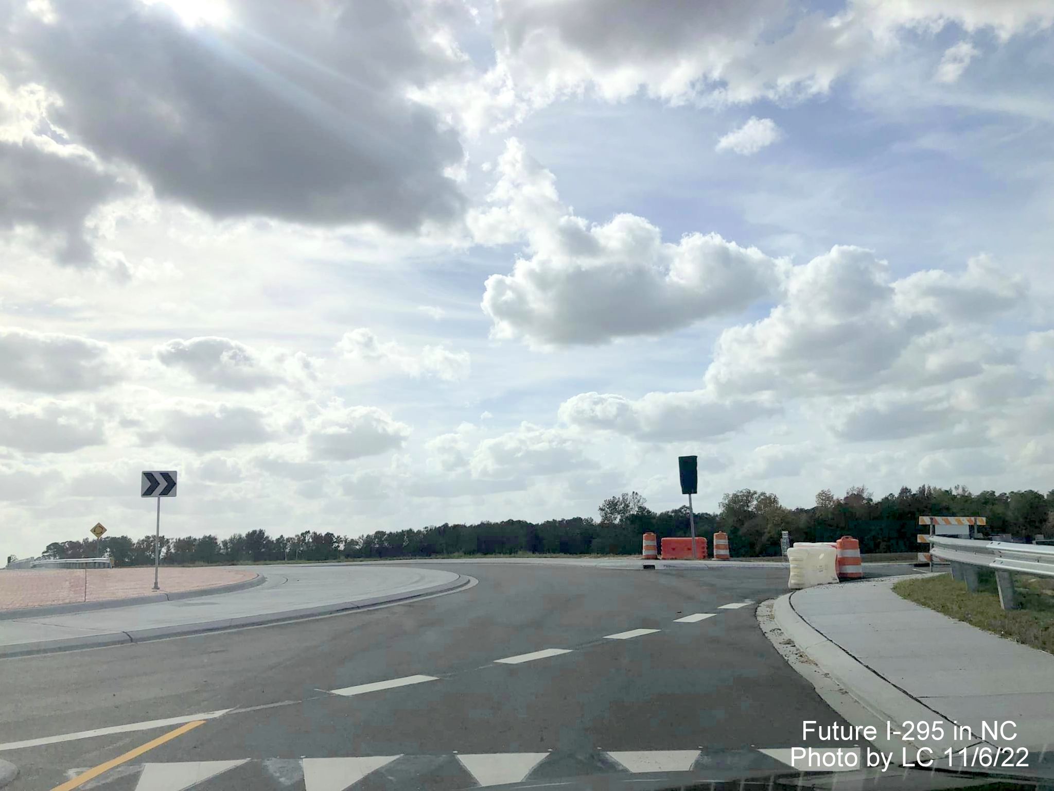 Image of view looking east toward roundabout on Parkton Road for soon to be opened off ramp of 
                                                 Fayetteville Outer Loop from Black Bridge Road, by LC, November 2022