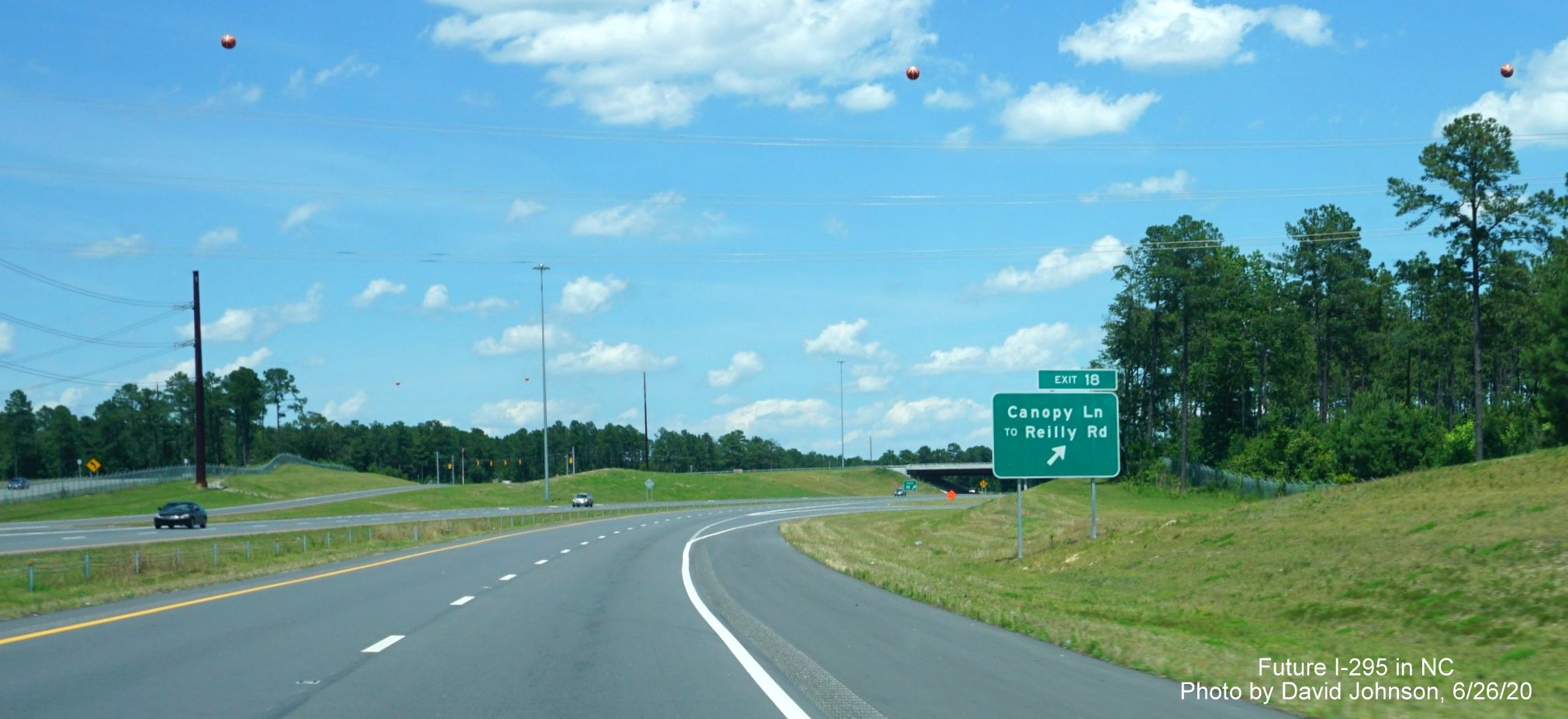 Image of Canopy Lane exit sign on NC 295(Future I-295) North in Fort Bragg, by David Johnson June 2020