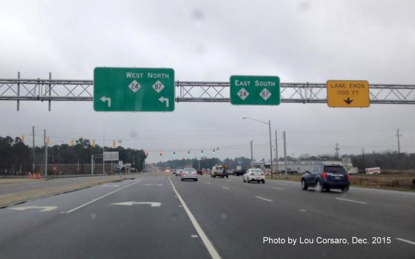 Image of overhead signage for NC 24/87 at Fayetteville Loop on-ramp on Bragg Blvd. Photo by Lou Corsaro