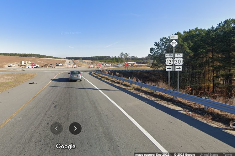 Image of NC 295 trailblazer still in place along ramp from I-95 North to I-295/Fayetteville Outer Loop exit 
       in Wade, Google Maps Street View, December 2022