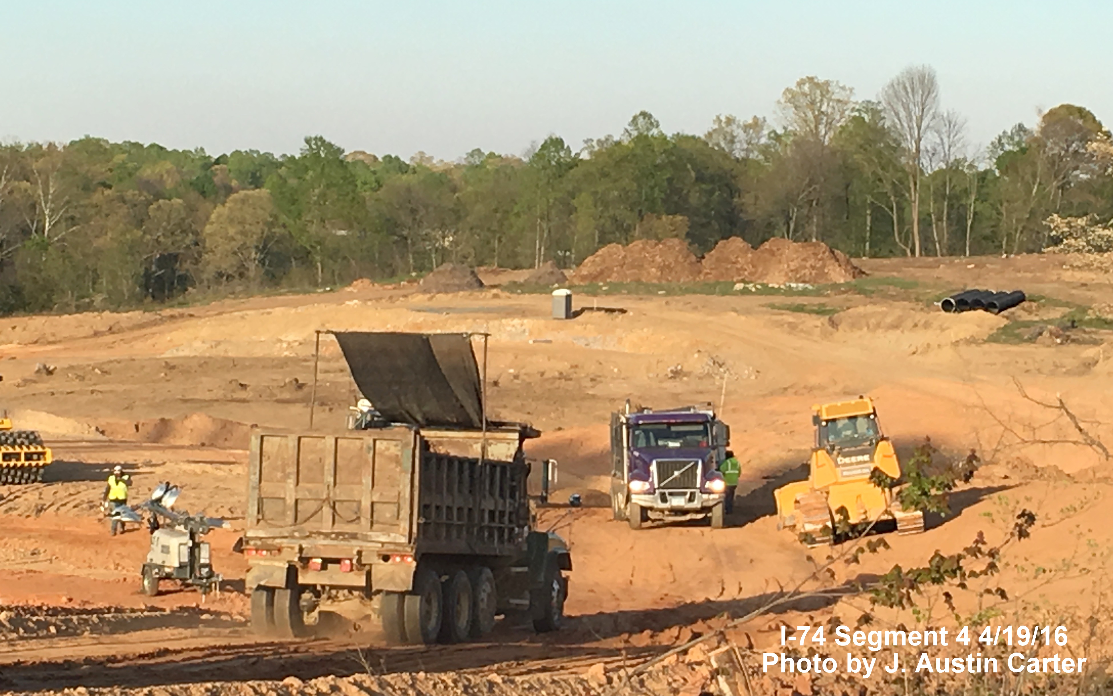 Image of construction work clearing area for new interchange between Beltway/I-74 and Business 40/US 421, 
      by J. Austin Carter