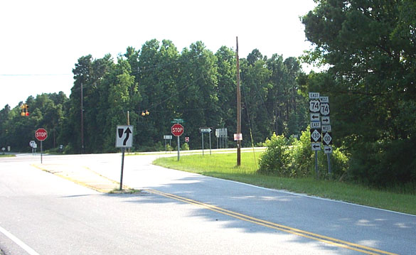 Photo of US 74/NC 130 intersection with NC 242 prior to start of 
interchange construction in July 2006
