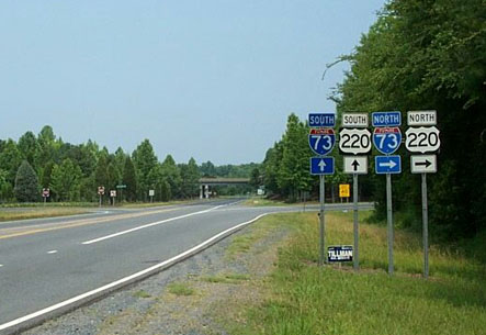 Photo of US 220 and Future I-73 signs at I-73 North onramp near Randleman in 
October 2002