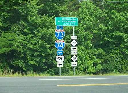 Photo of signage for I-73/I-74 at entrance to NC Zoo in Asheboro, June 2002