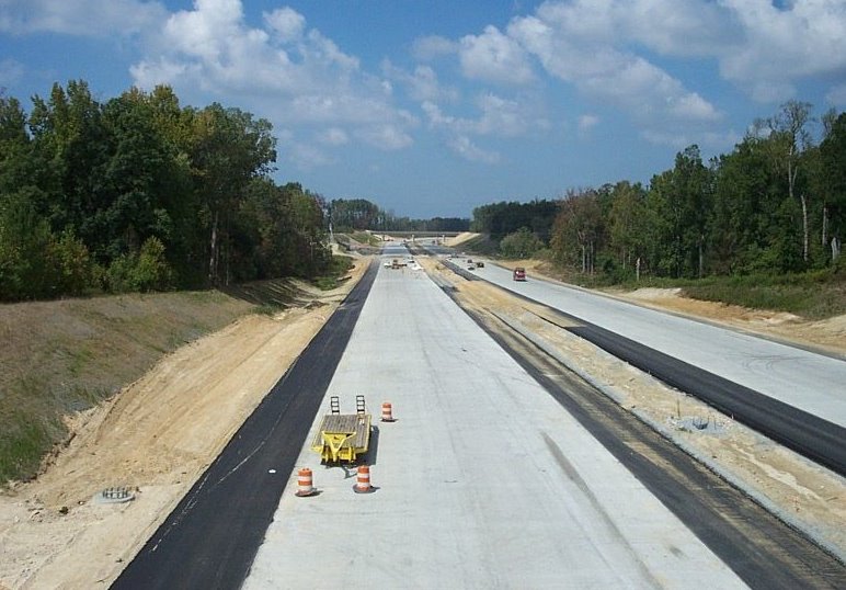 Photo of view westbound from High Point Road Bridge of Greensboro Urban Loop 
under construction, Sept. 2007