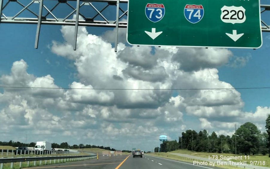 Image of overhead signs at beginning of I-73 North and I-74 West north of Rockingham, by Ben Thurkill