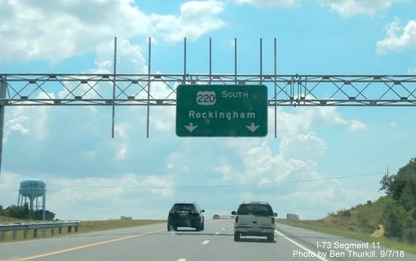 Image of overhead sign for US 220 South on gantry for future US 220 South exit on I-73 South/I-74 East in Richmond County, by Ben 
        Thurkill