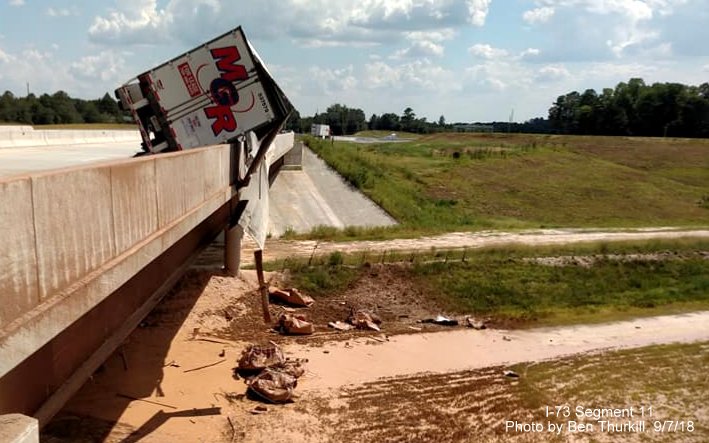 Image of truck rollover on US 220 South ramp bridge over future I-73/I-74 Rockingham Bypass, by Ben Thurkill