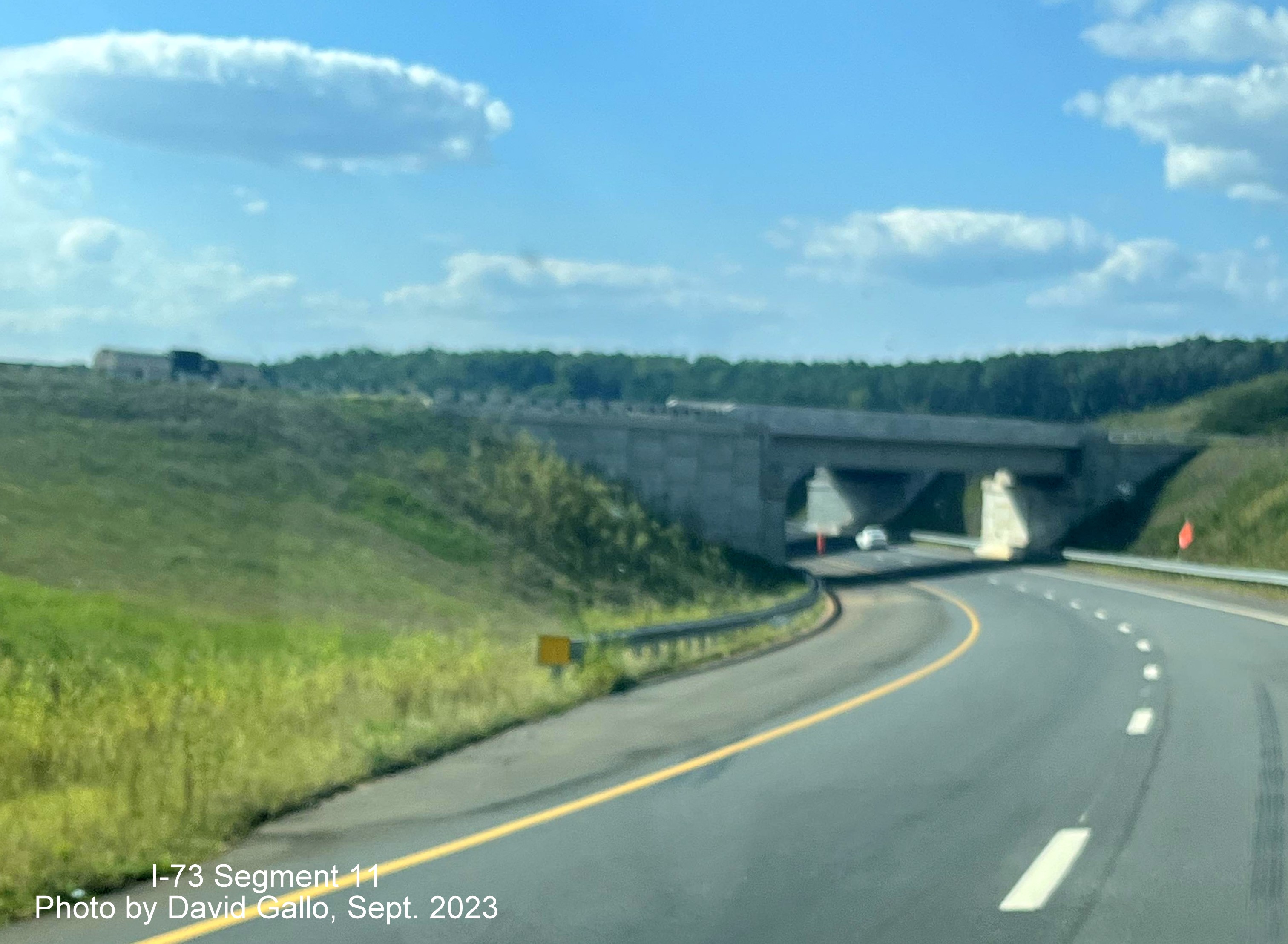 Image of US 74 West exit heading under ramp for Business 74 from future I-73 North/I-74 West Rockingham Bypass, by 
       David Gallo, September 2023