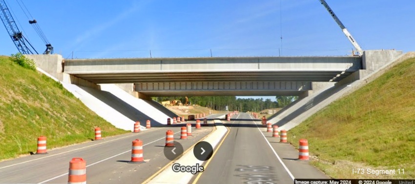 Image of Cartledge Creek Road headed under bridge that will carry I-73/I-74 Rockingham
          Bypass, Google Maps Street View, May 2024