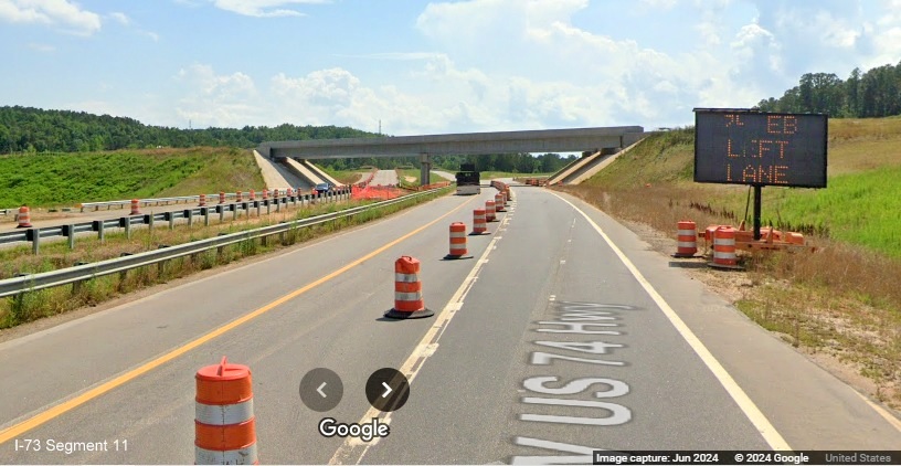 Image of temporary VMS advance sign for US 74 East ramp on Business 74 West near bridge
         for future Rockingham Bypass, Google Maps Street View, June 2024