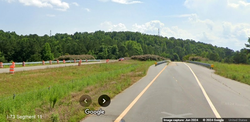 Image of Business 74 ramp approaching bridge over US 74, Google 
         Maps Street View, June 2024