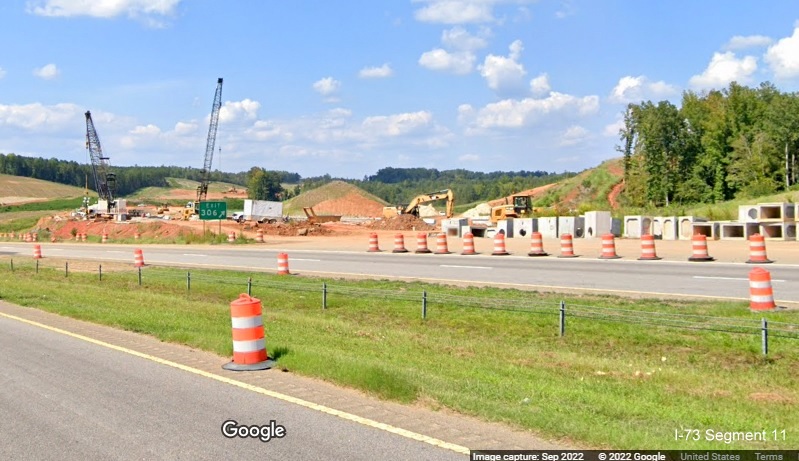 Image of former ramp to US 74 Business used as storage place for equipment constructing future I-73/I-74 Rockingham 
       Bypass, Google Maps Street View, September 2022