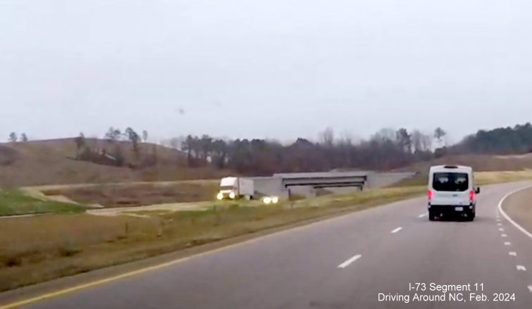 Image of approaching ramp from Future I-73 South/I-74 East/Rockingham Bypass to
          US 74 East, Driving Around NC, February 2024