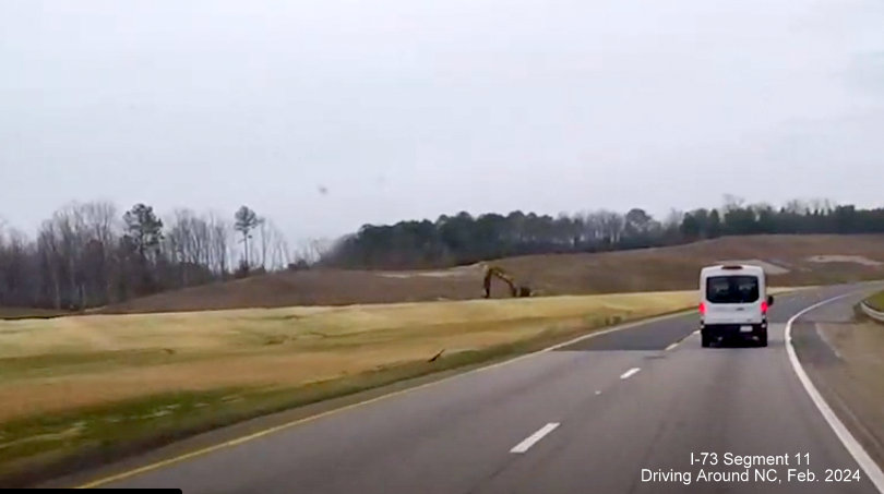 Image of approaching ramp from Future I-73 South/I-74 East/Rockingham Bypass to
          US 74 East, Driving Around NC, February 2024