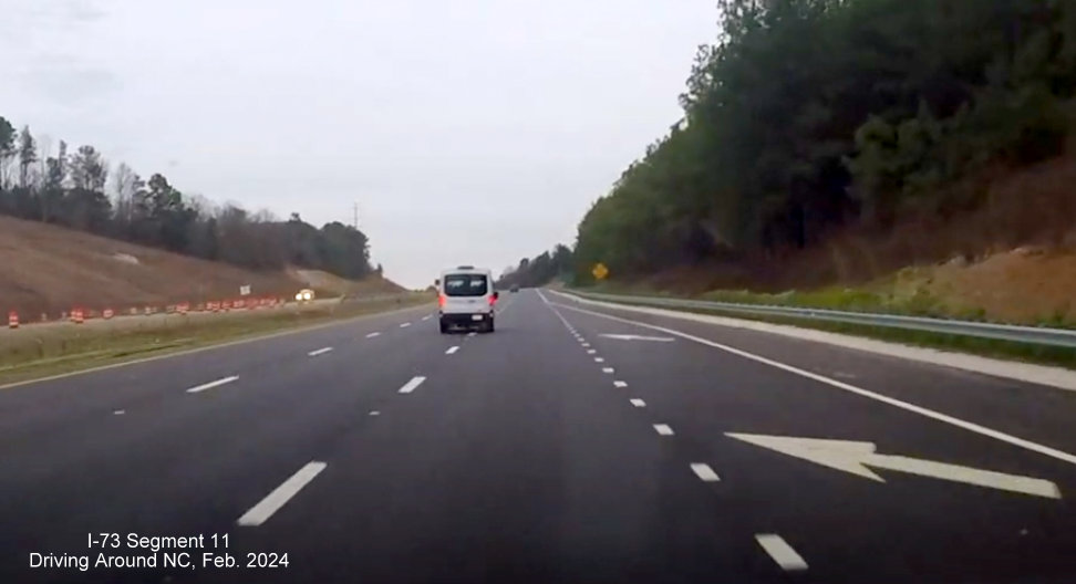 Image of right land ending along 3-lane Future I-73 South/I-74 East/and 
          US 74 East lanes at end of Rockingham Bypass construction zone, Driving Around NC, February 2024