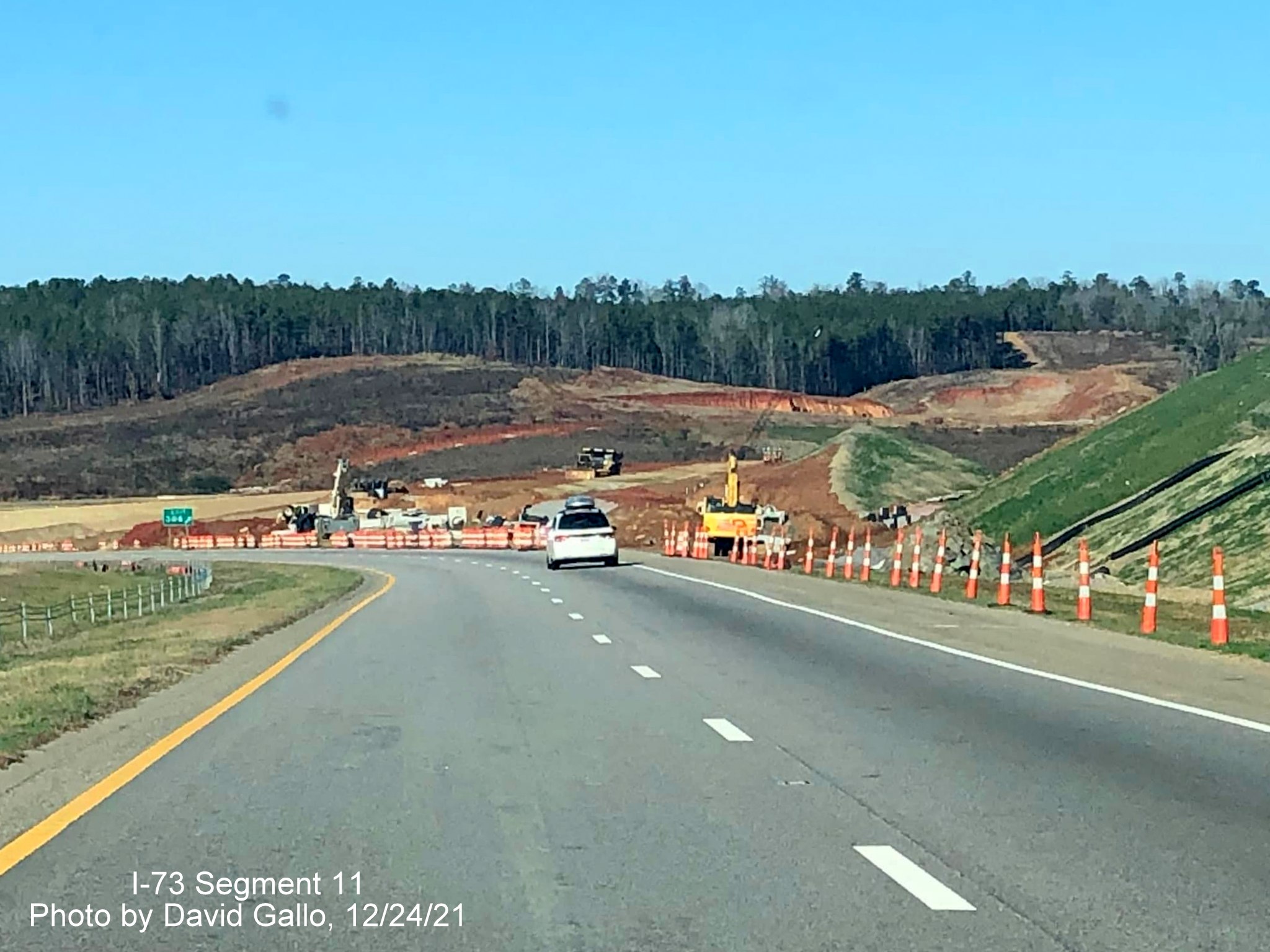 Image of grading continuing for future I-73/I-74 Rockingham Bypass as seen from US 74 West, by David Gallo, 
        December 2021