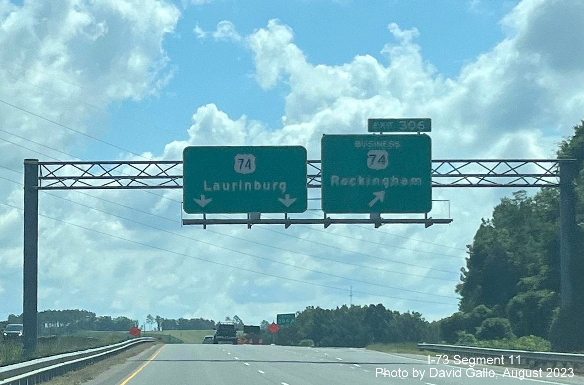 Overhead signage at exit for US 74 Business East on US 74 at start of Rockingham Bypass, David Gallo,
        July 2023