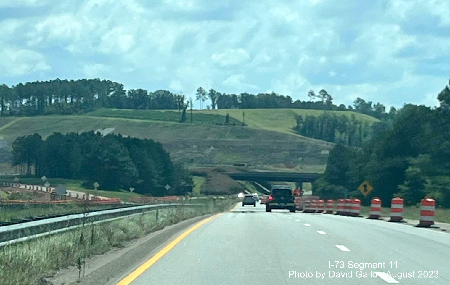 View of cleared area for future I-73/I-74 Rockingham Bypass interchange from US 74 East, David Gallo,
        July 2023