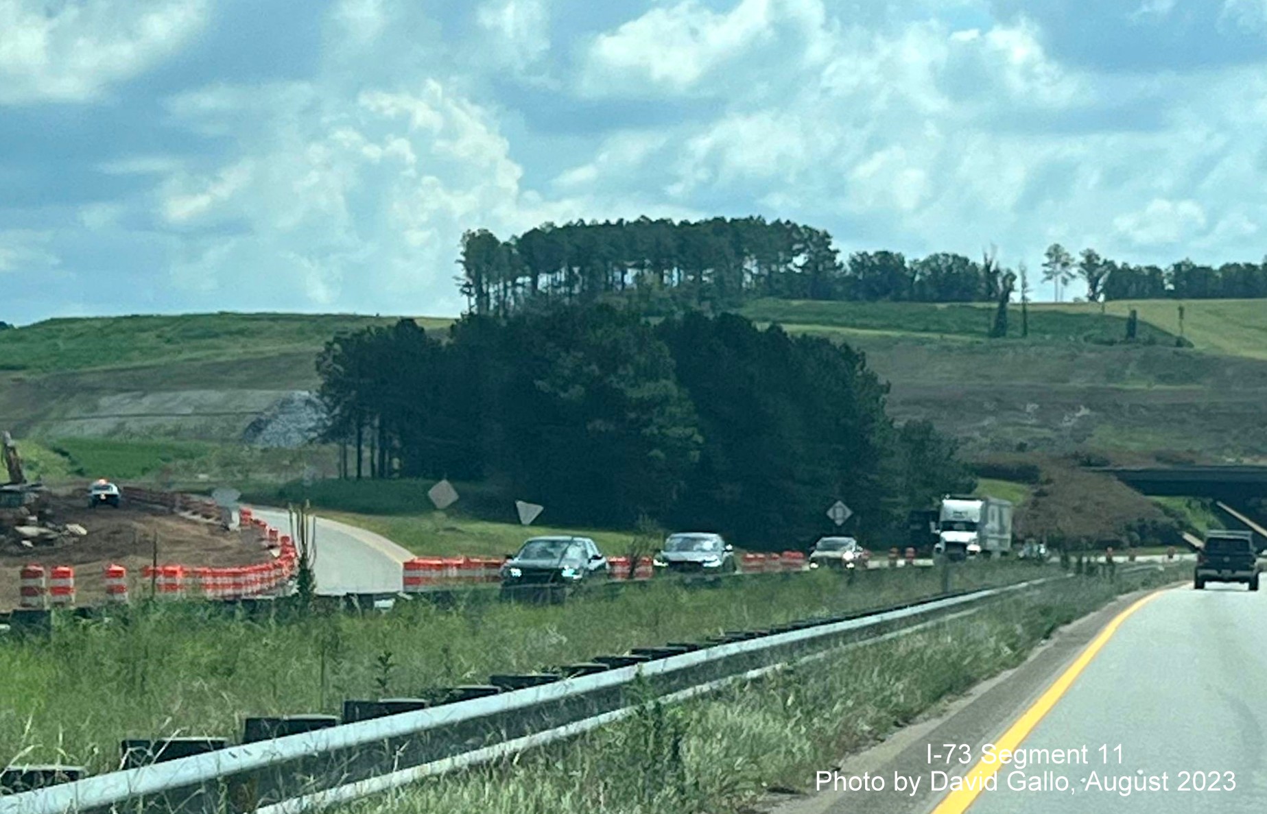 Image of widening work along US 74 Business ramp onto US 74 West prior to Rockingham Bypass work zone, David Gallo,
        July 2023